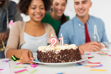 Image showing team greeting coworker at office birthday party