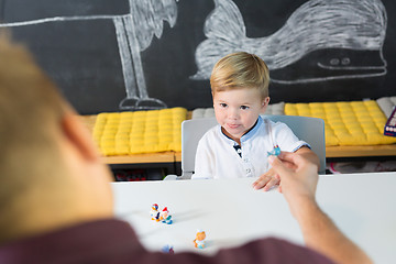 Image showing Cute little toddler boy at child therapy session.