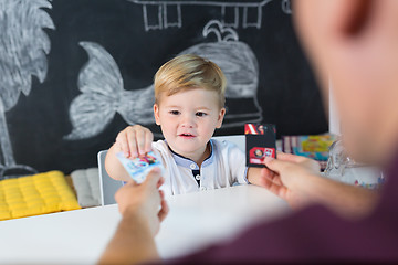 Image showing Cute little toddler boy at child therapy session.