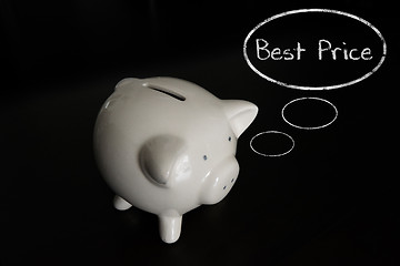 Image showing Piggy bank with thought bubbles, thinking BEST PRICE