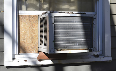 Image showing window air conditioner at suburban house