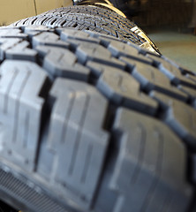 Image showing vehicle tires treads with selective focus