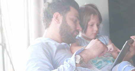 Image showing Father Daughter using Tablet in modern apartment