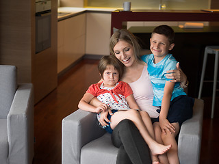 Image showing Young Family Using A Tablet To Make Future Plans