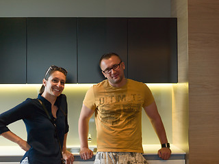 Image showing Young couple in the kitchen