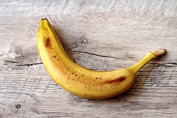 Image showing Banana on a wooden table.