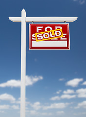 Image showing Right Facing Sold For Sale Real Estate Sign on a Blue Sky with C