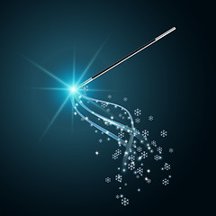 Image showing Magic wand with flying snowflakes