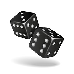 Image showing Two black falling dice isolated on white.