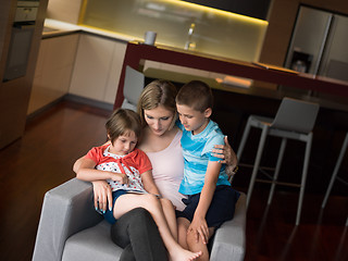 Image showing Young Family Using A Tablet To Make Future Plans