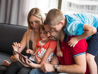 Image showing young cuple spending time with kids