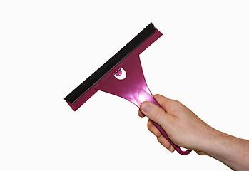 Image showing hand holding a tool for cleaning the glass