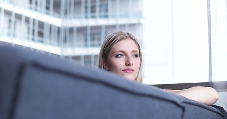 Image showing woman using tablet in beautiful apartment