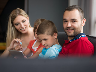 Image showing young cuple spending time with kids