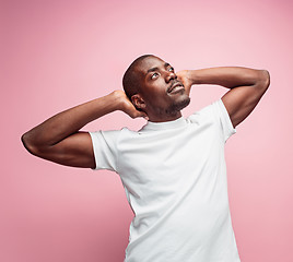 Image showing Positive thinking African-American man on pink background