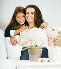 Image showing happy mother with daughter at home