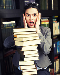 Image showing stock photo portrait of beauty young woman reading book in library