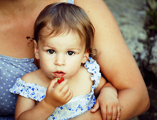 Image showing little girl with mother outside