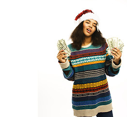 Image showing cute young african girl in santas red hat with money isolated