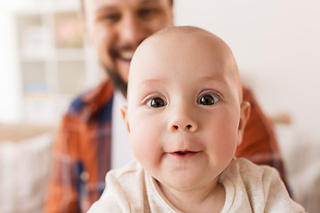 Image showing close up of happy little baby boy with father