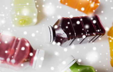 Image showing bottles of different fruit or vegetable juices