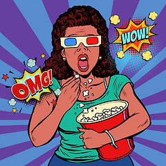 Image showing Woman in 3d glasses watching a scary movie and eating popcorn