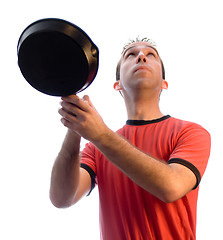 Image showing Man Catching Food In Pan