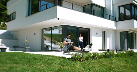 Image showing Rowing Machine on terrace of beautiful villa