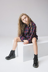 Image showing Stylish young teen girl over gray background