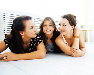 Image showing Mature sisters twins at home with little daughter, happy family