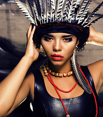 Image showing young pretty woman with make up like red indian