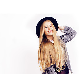 Image showing young pretty hipster girl in hat posing smiling cheerful on white background, lifestyle people concept 