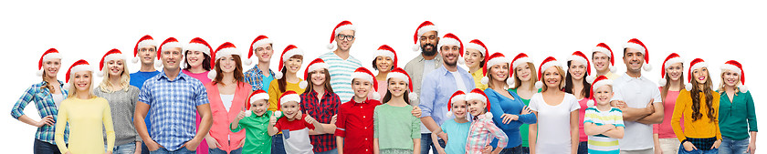 Image showing group of happy people in santa hats