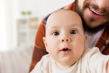 Image showing close up of happy little baby boy with father