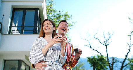 Image showing drinking coffee on terrace of villa in the morning