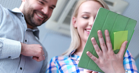 Image showing low angle shot of business people using technology