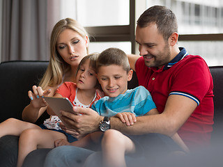 Image showing young cuple spending time with kids