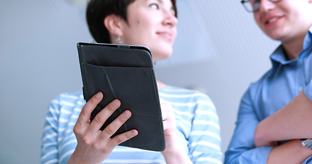 Image showing low angle shot of business people using technology