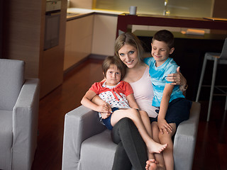 Image showing Young Family Using A Tablet To Make Future Plans