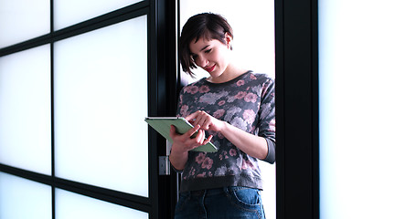 Image showing Business Woman Using Digital Tablet in front of Office