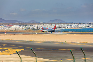 Image showing ARECIFE, SPAIN - APRIL, 15 2017: Boeing 757 - 200 of JET2 with t