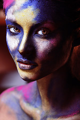 Image showing beauty woman with creative make up like Holy celebration in Indi