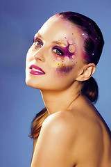 Image showing beauty young woman with creative make up, mystery tinsel