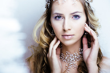 Image showing beauty young snow queen with hair crown on her head, complicate 