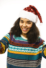 Image showing cute young real african hipster girl in santas red hat isolated 