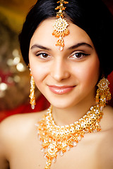 Image showing beauty sweet real indian girl in sari smiling on black background