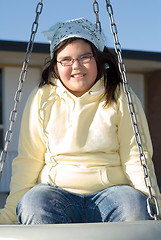 Image showing Girl On Tire Swing