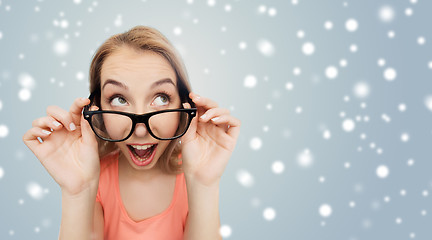 Image showing happy woman or teenage girl in eyeglasses