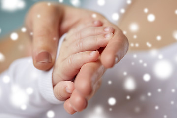 Image showing close up of mother and newborn baby hands