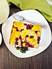 Image showing Pie with black currant in plate on board top